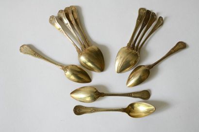 Suite of twelve dessert spoons in gilt red...