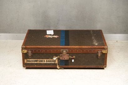 Malle Louis VUITTON en toile enduite imprimée...