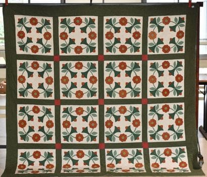 Quilt d'été fond vert à petits motifs organisant...