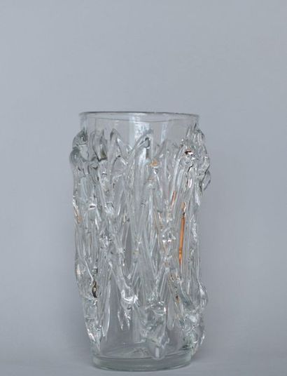 Crystal vase with free-form relief decoration....