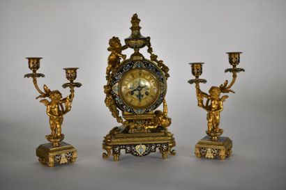 Gilded bronze mantel set enamelled with floral...