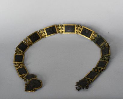 Brass belt, with moving elements applied...