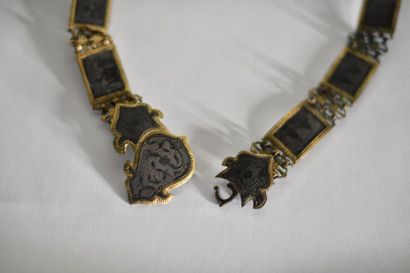 Brass belt, with moving elements applied...
