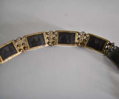 Brass belt, with moving elements applied...