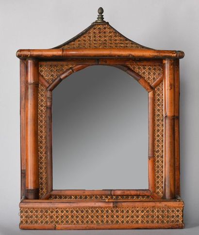 Mirror in a pagoda frame made of bamboo and...