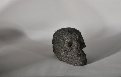 Carved granite monkey skull. 

Possibly Java...