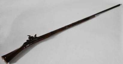 North African flintlock rifle. 

Bone inlay...