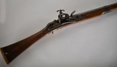 North African flintlock rifle. 

Bone inlay...