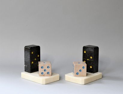 Pair of colored marble bookends with dice...
