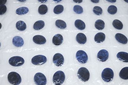 Important lot of sodalite cabochons 

Dim...