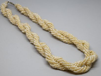 Necklace with double twists of pearls probably...