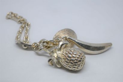 Silver bag charm with exotic fruits



Provenance...