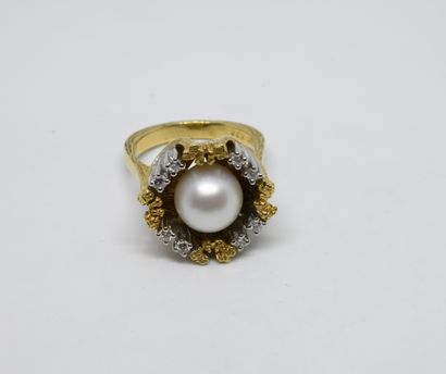 Bague fleur en or jaune et blanc 585 millièmes...