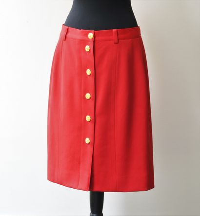 CELINE, Paris. Red wool skirt with six golden...