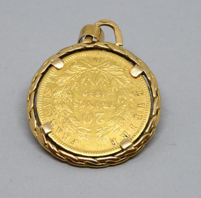 Yellow gold pendant 750‰, set with a 20FF...