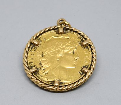 Yellow gold 750‰ pendant, the setting with...