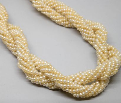Necklace with double twists of pearls probably...