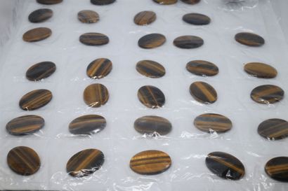 Important lot of oval tiger eye cabochons

Size...
