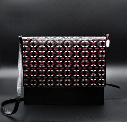 Charles JOURDAN. Shoulder bag in black leather...