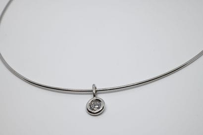 Pendant decorated with a diamond (of approximately...