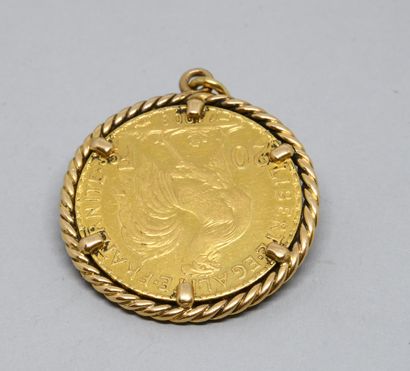 Yellow gold 750‰ pendant, the setting with...