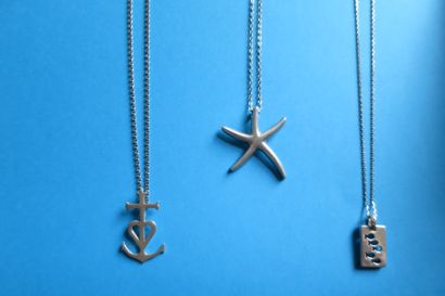 Set of three silver pendants with marine...