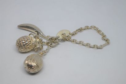 Silver bag charm with exotic fruits



Provenance...