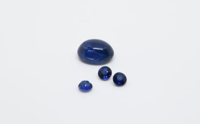 Lot of stones on paper including a sapphire...