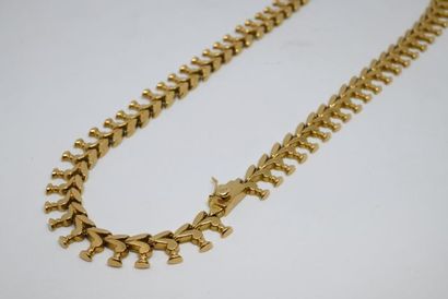 Collier draperie en or jaune 750‰

Poinçon...