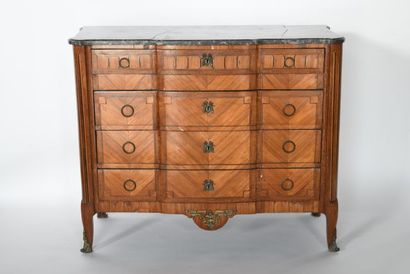 Chest of drawers with a slight central projection...