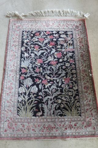 Oriental silk carpet, handmade with central...