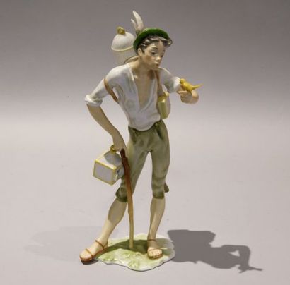 Porcelaine de Saxe XXème. 

Oiseleur en porcelaine...