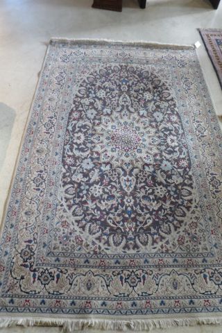 Oriental handmade carpet probably made of...