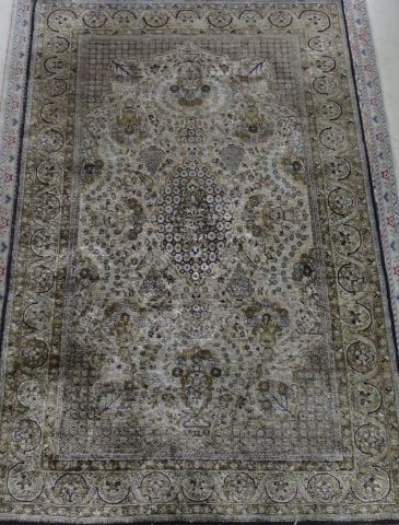Handmade Persian silk carpet with central...