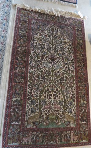 Wool carpet decorated with a tree of life...