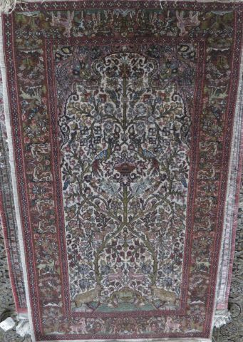 Wool carpet decorated with a tree of life...