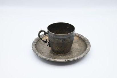 Silver cup and saucer, with braided pattern...