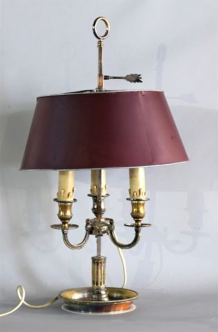 Lampe bouillote en métal doré soulignée de...