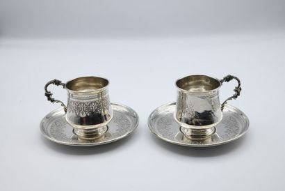 Pair of silver cups and their undercups with...