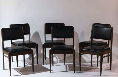 Suite de six chaises en teck et skaï noir.

Circa...