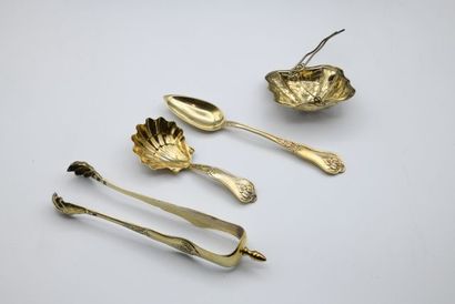 A vermeil tea set comprising twelve spoons,...