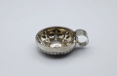 Small silver wine taster with embossed decoration...