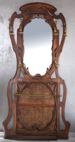 
Important porte-manteau en acajou et laiton...
