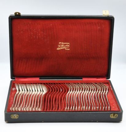 Part of a silver menagere with a scroll pattern,...