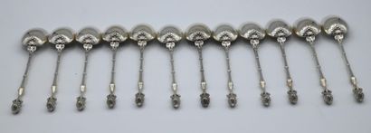 Set of twelve silver dessert spoons, the...
