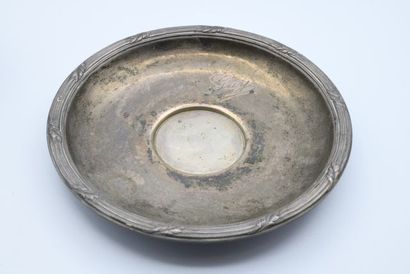 Silver cup and saucer, with braided pattern...