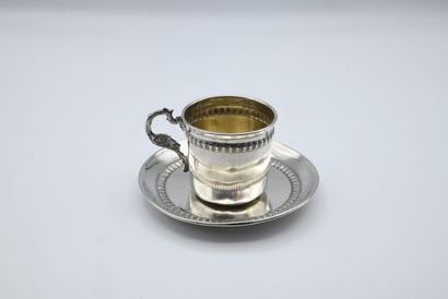 Silver cup and saucer, with frieze of gadroons...