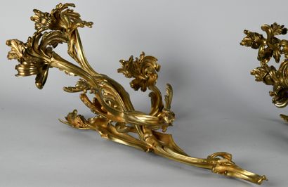 Paire d'appliques à trois bras de lumières...