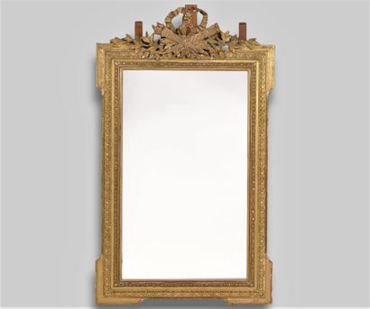Grand miroir à écoinçons en bois sculpté...