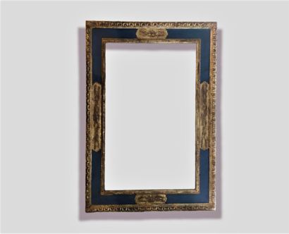 Miroir à parclose, le cadre en bois sculpté...